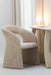 Beige gestoffeerde eetkamerstoel met een modern, rond design en zachte textuur, afmeting 66x65x86 cm.