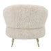 Beige fauteuil Franklyn van PTMD met aaibare polyester bekleding en slank metalen onderstel.