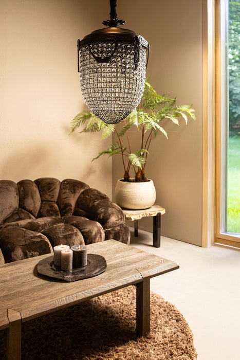 Ovale PTMD Lidde hanglamp van 82 cm met grijs glas in een sfeervol interieur.