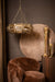 Goudkleurige PTMD hanglamp van 70x70x21 cm met facetgeslepen glas in een luxe, decoratief interieur.
