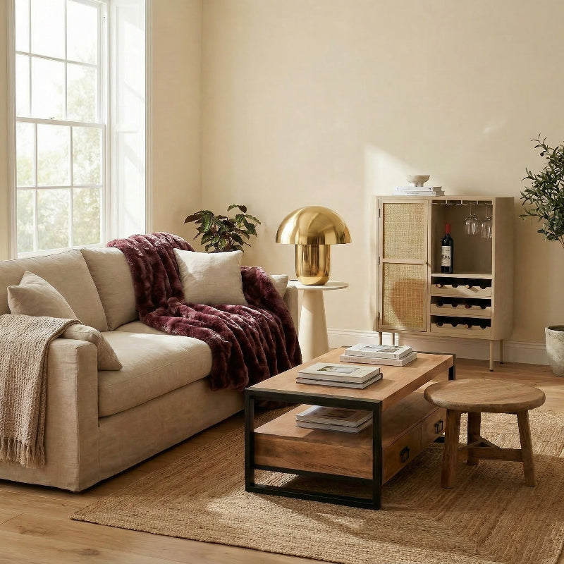 Image of a living room in winter setup with warm blankets